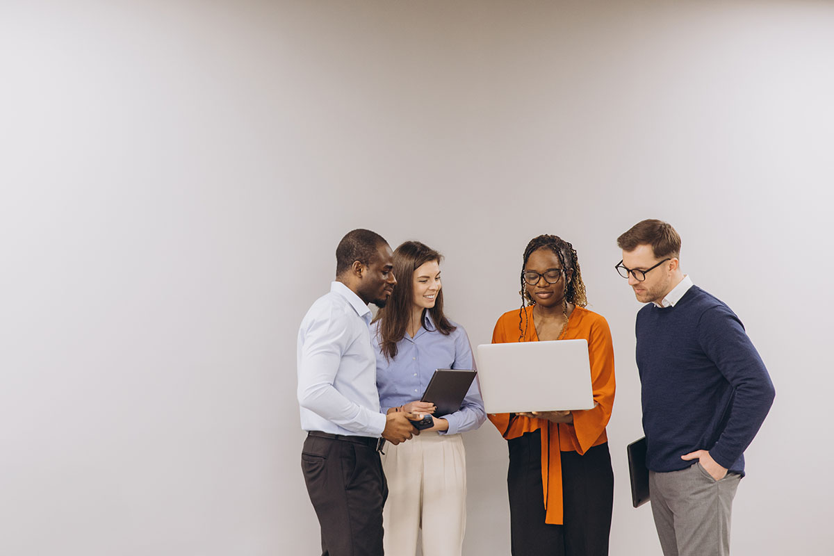 Diverse business team collaborating in a modern office during a professional meeting